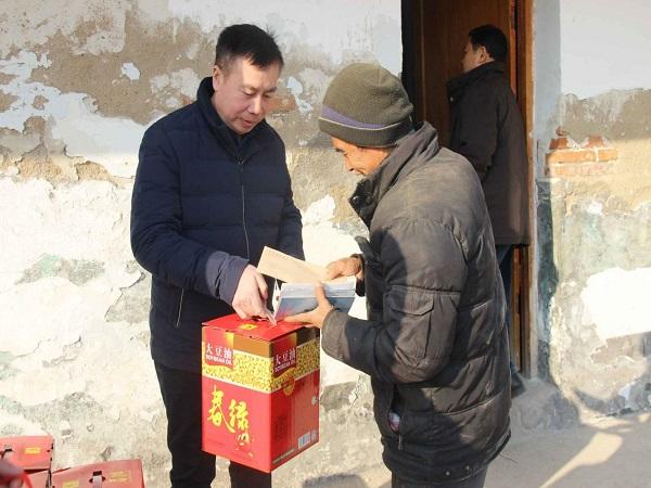 2018.2.9市农机局:就业春风吹进门 春节慰问暖心窝07.jpg