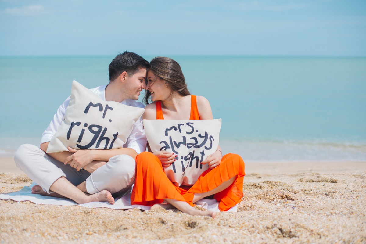 man-and-woman-wearing-cloths-sitting-on-brown-sand-near-792729.jpg